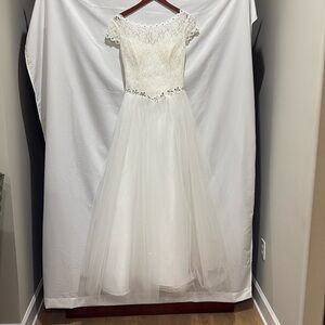 Long white lace and tulle dress with accents